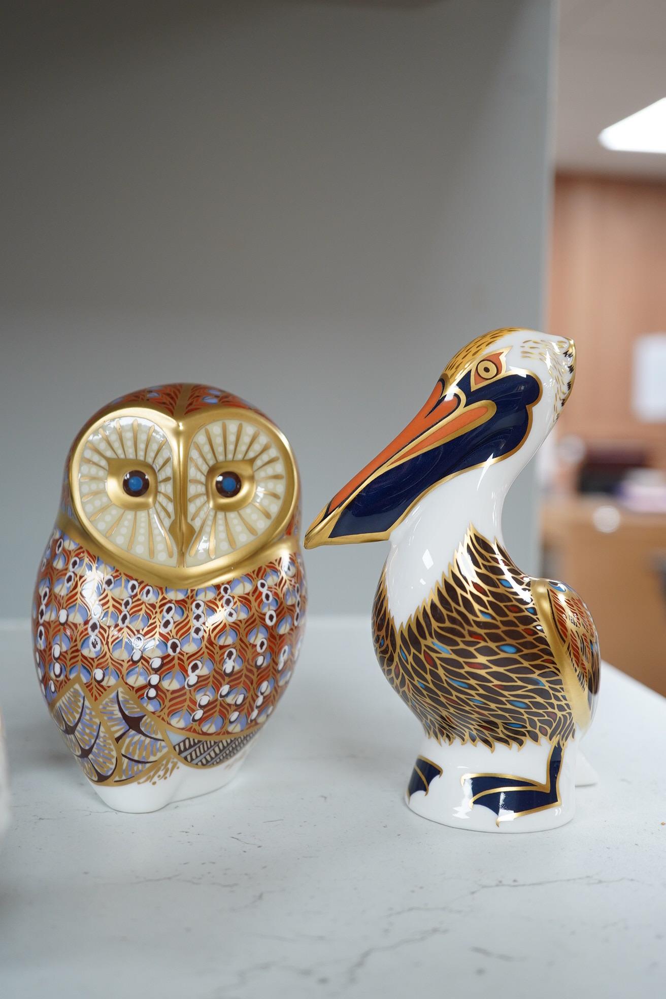 A collection of ten Royal Crown Derby animal paperweights, tallest pelican 13cm high. Condition - good